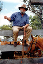 Jack reciting bush poetry at a fence